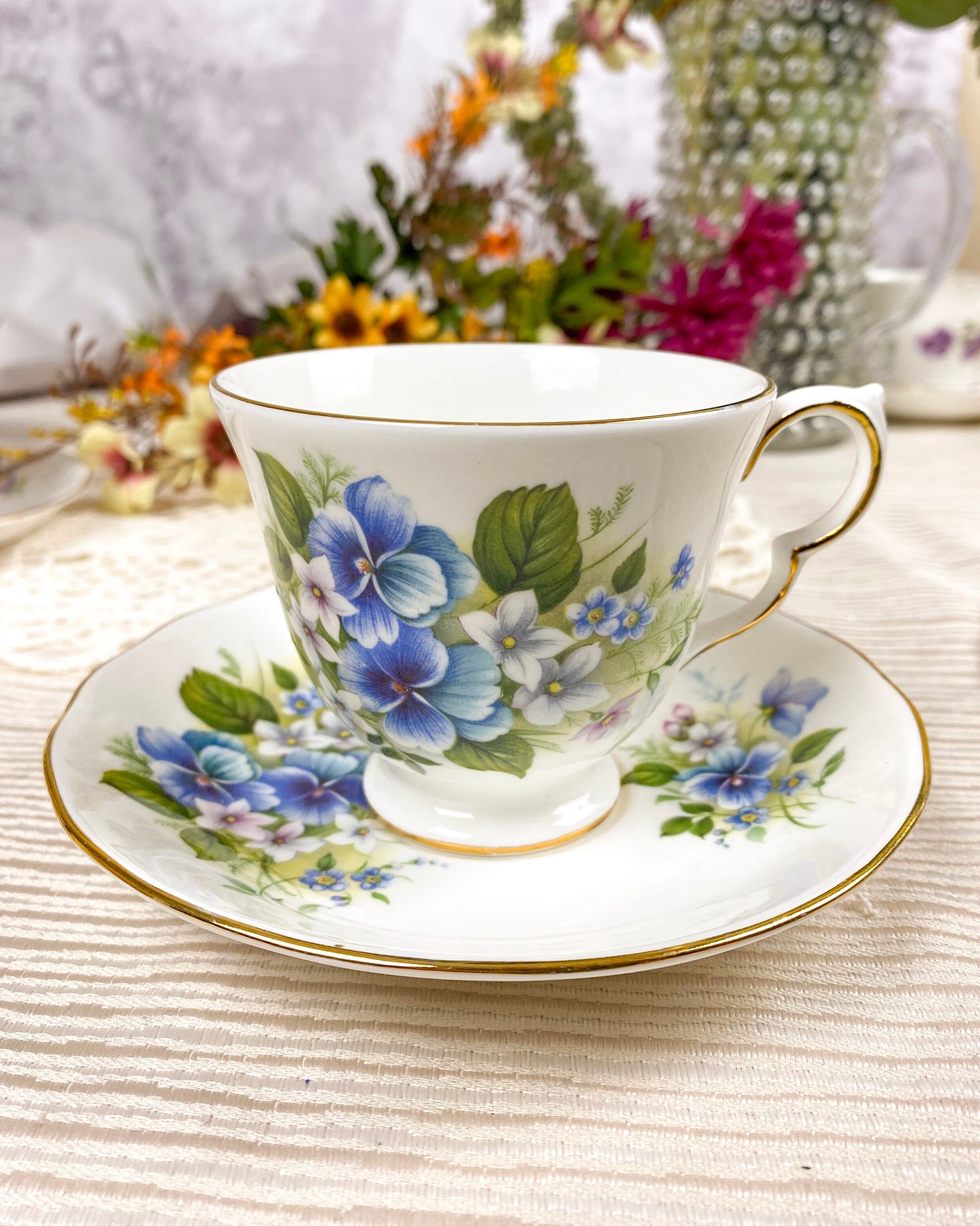 Vintage Queen Anne Blue Pansy Floral Teacup and Saucer White Bone China