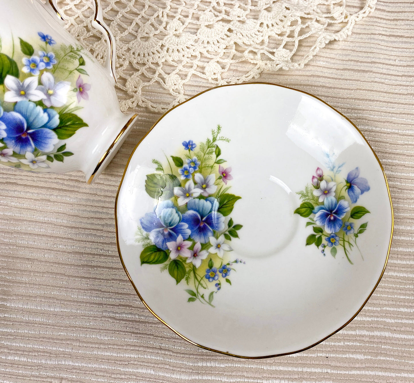 Vintage Queen Anne Blue Pansy Floral Teacup and Saucer White Bone China